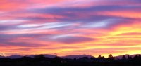 Alto-Status Clouds alight by setting sun N.M.